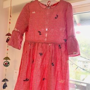 Beautiful knee length dress with a knot tie back